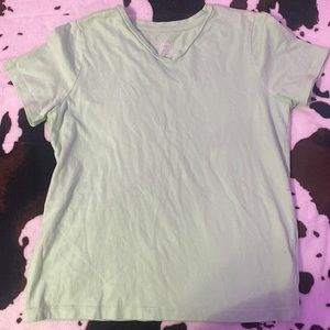 I’m selling a cute light green shirt really nice